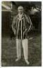 Arthur Edward Robert Gilligan. Cambridge University, Surrey, Sussex & England 1919-1932. Mono real photograph postcard of Gilligan, standing full length, wearing a striped blazer. Signed in ink to the image by Gilligan. Nias of Brighton. Good/ very good c