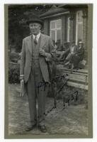 Pelham Frances ‘Plum’ Warner, Oxford University, Middlesex & England 1894-1920. Original mono photo card of Warner standing full length in suit and hat, nicely signed in black ink ‘P.F. Warner’ and dated ‘August 1937. The card laid down to slightly larger