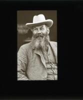 W.G. Grace 1900. Original glass plate/ magic lantern slide of an image of W.G. Grace, half length wearing a suit and hat, probably taken on the steps of the Crystal Palace cricket pavilion. The plate measures 3.25” square. An excellent unpublished image o