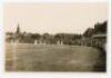 Australia tour to England 1930. Three original previously unpublished candid-style mono photographs depicting play in progress at Trent Bridge. One features Don Bradman close to the boundary edge, the scoreboard in the background. The other two images are - 3