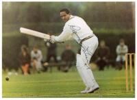 West Indies. Colour photograph of Garry Sobers in batting action signed to the photograph by Sobers. 8.25”x6”. A colour photograph of Courtney Walsh and Curtley Ambrose celebrating winning the Wisden Trophy, the photograph signed by both players, 10”x7”. 