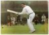 West Indies. Colour photograph of Garry Sobers in batting action signed to the photograph by Sobers. 8.25”x6”. A colour photograph of Courtney Walsh and Curtley Ambrose celebrating winning the Wisden Trophy, the photograph signed by both players, 10”x7”. 