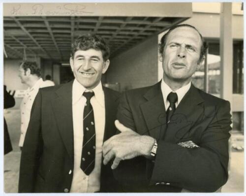 England players on tour. Mono press photograph of Geoff Boycott and Ken Barrington standing together at an airport wearing tour ties and blazers, probably late 1970s. Signed to the photograph by both, the signatures slightly faded. 10”x8”. Publisher unkno