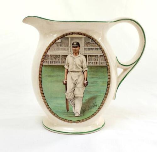 John Berry ‘Jack’ Hobbs, Surrey & England 1905-1934. New Hall Pottery white water jug, printed with an oval colour portrait of Hobbs, wearing England cap walking out to bat, with stands and spectators to background, printed signature below. Crossed bats, 