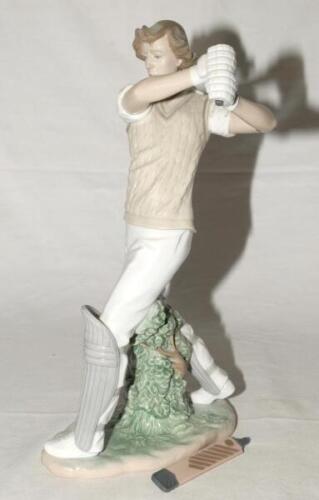 Lladro, Spain. ‘Cricket Player’. Elegant porcelain figure of a cricketer playing a flowing drive, designed by the sculptor, Regino Torrijos. Maker’s mark to base, dated 2001, withdrawn from circulation in 2005. 17” tall. Sadly the bat has broken at the ha