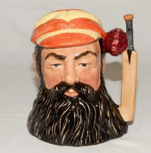 W.G. Grace. Large Royal Doulton ceramic caricature toby jug of W.G. Grace wearing M.C.C. cap, with cricket bat and ball handle. Approx 7” tall. Doulton backstamp to base, 1996. Very good condition