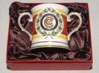 M.C.C. Bicentenary 1787-1987. Spode china two handled loving tankard with decoration and titles to front and back, gold lustre to handles, rim, and base. 4.5” tall. In presentation box as issued. Splitting and tape repairs to the presentation box, the tan