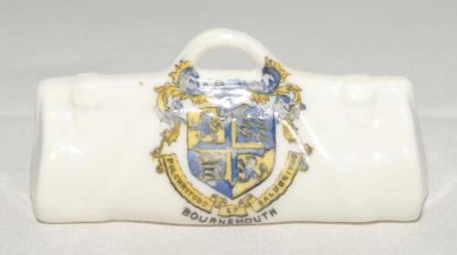 Cricket bag. Small crested china cricket bag with colour emblem for ‘Bournemouth’. Approx 3.25” long. Arcadian China. G