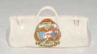 Crested cricket bag. Medium crested china cricket bag with colour emblem for ‘Egham’ with rare and unusual ‘Cricket Week. Tonbridge’ inscription to verso. Arcadian China. Approx 4” long. G