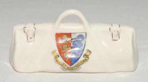 Crested cricket bag. Medium crested china cricket bag with colour emblem for ‘Great Yarmouth’. Carlton China. Approx 4” long. G