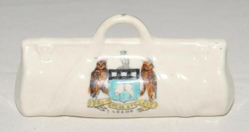 Cricket bag. Large crested china cricket bag with colour emblem for ‘Leeds’. No maker’s mark (Dainty China ware?). Approx 4.25” long. G