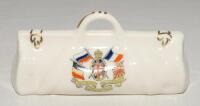 Cricket bag. Very large crested china cricket bag with colour emblem for ‘The Triple Entente. The Allied Armies. United We Stand’. ‘British Manufacture’. Approx 4.5” long. G