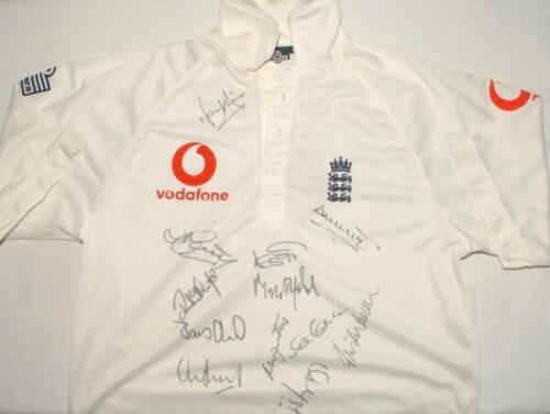 England c.1999. White short sleeve shirt with three lions emblem to chest, and Vodafone sponsor’s logos to chest and sleeve. Signed to the front by twelve England players including Hussain, Flintoff, Gough, Butcher, Atherton, Ramprakash, Caddick, Croft et