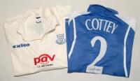 Sussex C.C.C. 2000s. Long sleeve ‘Sussex Sharks’ blue shirt with white trim, County emblem and sponsors’ logos to front, player’s name and number ‘Cottey 2’ to back. Signed to the back by Tony Cottee. Sold with a white Sussex C.C.C. long sleeve shirt with