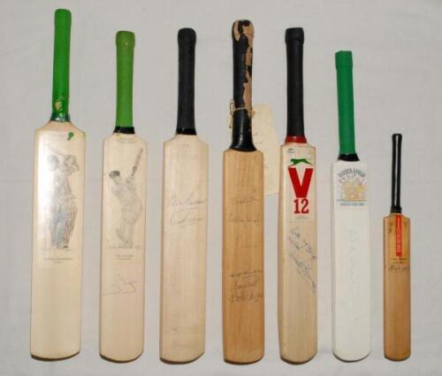 Signed miniature bats. Seven miniature cricket bats, the majority signed or multi-signed. Various sizes. &lsquo;Art of Sport Miniature Collection&rsquo; of Sachin Tendulkar (18&rdquo;, unsigned), and Steve Waugh (17&rdquo;, signed). Two unbranded bats, one signed by Alec and Eri