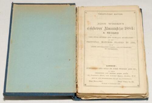 Wisden Cricketers’ Almanack 1884. 21st edition. Bound in mid blue boards, lacking original paper wrappers, with date on label to spine. Breaking to spine block, the pages of the book becoming detached, lacking first advertising page, the first two pages d