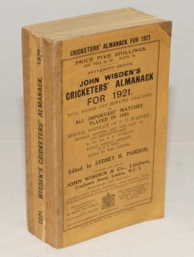 Wisden Cricketers' Almanack 1921. 58th edition. Original paper wrappers. Partial reinforcement to spine paper. Small corner repair to top right hand corner of front wrapper, some darkening and age toning to wrappers and spine paper otherwise in good/very 