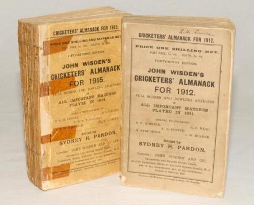 Wisden Cricketers‚‘ Almanack 1912 and 1915. 49th and 52nd editions. Original paper wrappers. The 1912 edition with some minor wear and age toning to wrappers with odd minor loss to corners, some wear to spine paper with small loss to the base of the spine