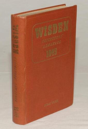 Wisden Cricketers‚‘ Almanack 1945. 82nd edition. Original hardback. Only 1500 hardback copies were printed in this war year. Dulling to gilt titles on spine paper, old tape marks to end papers laid down to inside boards otherwise in generally good/very go