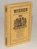 Wisden Cricketers’ Almanack 1945. 82nd edition. Original limp cloth covers. Only 6500 paper copies printed in this war year. The book slightly cocked to the right, minor discolouration to the cover extremities otherwise in good+ condition. Rare war-time e