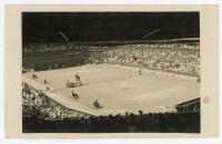 Wimbledon Ladies Championships 1920s. Rare original and early mono real photograph postcard of a ladies singles match in progress on Centre Court. Players unknown, possibly Suzanne Lenglen. Edwin Trim & Co. of Wimbledon to lower right corner, series no. W