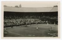 ‘Wimbledon Centre Court’ 1936. Original mono action real photograph postcard with a ladies doubles first round match in progress. Jadwiga Jƒôdrzejowska & Susan Noel v Marie Horn & Anita Lizana. Card no. V101 in a series issued by Edwin Trim & Co. of Wimbl