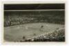 ‘Wimbledon Centre Court’ 1937. Original mono action real photograph postcard with a men’s third round doubles match in progress, Pat Hughes & Raymond Tuckey v Marcel Bernard & Jean Borotra. Card no. F75 in a series issued by Edwin Trim & Co. of Wimbledon,