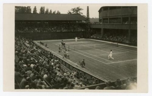 ‘Wimbledon Number One Court’ circa 1937. Original mono action real photograph postcard with a men’s singles match in progress. Un-numbered postcard issued by Edwin Trim & Co. of Wimbledon, publishers blind stamp to lower corner. Postally unused. Very good