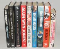 Signed football and rugby biographies. Three football titles, ‘Behind the Network’, Bob Wilson 2003. ‘Seeing Red’, Graham Poll 2004. ‘Geoff Hurst, The Hand of God and the Biggest Rows in Football’, Graham Poll 2009. Six rugby titles, ‘Thanks to Rugby’, Bi