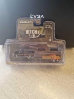 Green light Collectibles Hitch & Tow Series 17 1977 Ford F-100 and freewheeling stripes & Flat bed Traier in original packaing