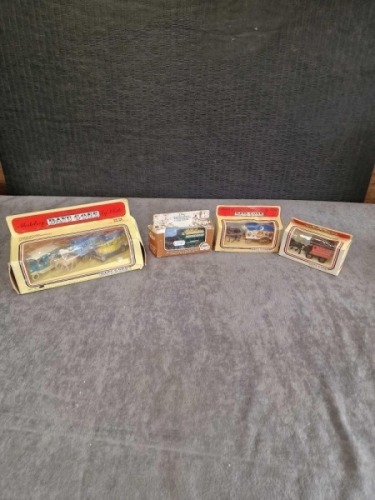 3x Lledo Horse drawn vehicles & one Lledo set including s horse drawn vehicle & two vans