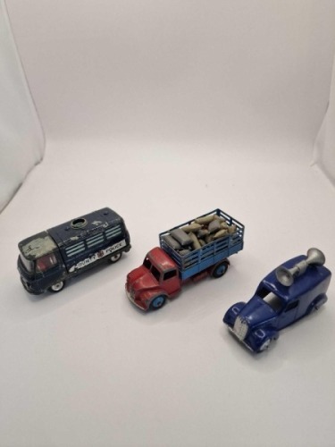 A collection of Corgi and Dinky diecast models x 3 unboxed comprising Corgi #464 Commer &Aring;&ldquo;County Police &Acirc; Van produced 1966-1969 Dinky #30n Dodge Farm Produce Wagon Red/Blue - Later renumbered to 343 complete with diecast pig figures produced 1950-1954 an