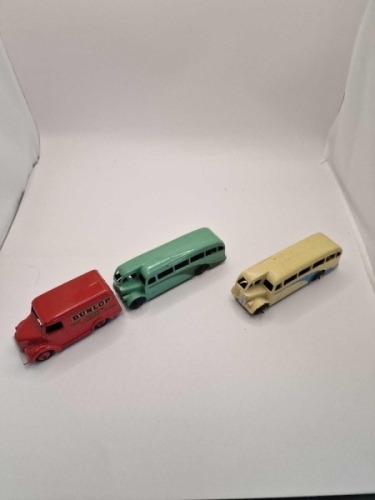 A collection of Dinky diecast models x 3 unboxed comprising of Dinky #31b Trojan 15cwt Van (Dunlop) Red Maroon Hubs. Later renumbered to 451 produced from 1952-1954, Dinky 29e Single Deck Bus Green/Green - Ridged hubs produced 1948 &acirc;&euro;&oelig; 1952 Dinky #29E ISO
