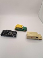 A collection of Dinky diecast models x 3 unboxed comprising of Dinky 30h Daimler Ambulance Cream - Red crosses & wheels. Later renumbered to 253 produced 1950-1954 Dinky 254 Austin Taxi Green/Yellow - Re-numbered from 40h produced 1956-1959 Dinky 256 Humb