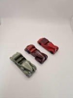 A collection of Dinky diecast models x 3 unboxed comprising of Dinky 38b Sunbeam Talbot Sports Car red produced 1946 &acirc;&euro;&oelig; 1950 Dinky 38d Alvis Sports Tourer Maroon/Red (Smooth Hubs) - Early Post War variation with smooth hubs produced 1945-1946 and Dinky 3