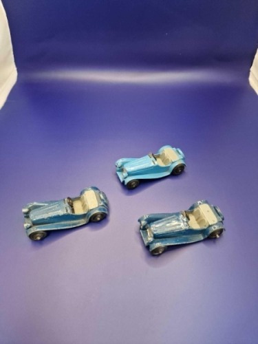 A collection of Dinky diecast models x 3 unboxed comprising of Dinky 38f Jaguar Sports Car Light Blue/Grey (Post War) - 1 celluloid windscreens. Ridged hubs produced 1946 - 1955 and 2 x Dinky 38f Jaguar Sports Car Blue/Grey (Post War) one with one cellul