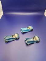 A collection of Dinky diecast models x 3 unboxed comprising of Dinky 38f Jaguar Sports Car Light Blue/Grey (Post War) - 1 celluloid windscreens. Ridged hubs produced 1946 - 1955 and 2 x Dinky 38f Jaguar Sports Car Blue/Grey (Post War) one with one cellul