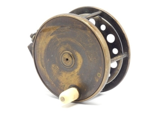 A Hardy 1896 Brass Perfect 4 ¼" salmon fly reel, domed ivorine handle, pierced bridge foot (lacking one foot end), strapped rim tension screw with Turk's head locking nut and early calliper spring check mechanism, open ball race with phosphor bronze beari