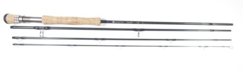 A Hardy "Sintrix Proaxis" 4 piece carbon saltwater fly rod, 9', #8, blue silk wraps, anodised screw grip reel fitting, light use only, in bag and alloy tube with outer cloth sleeve