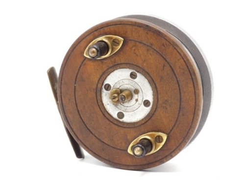 A Zephyr News of the World Prize 4 ?" centre pin reel, walnut and alloy backed drum with twin composition handles and brass spring release latch, brass stancheon foot, engine turned alloy backplate engraved presentation details, 1950's