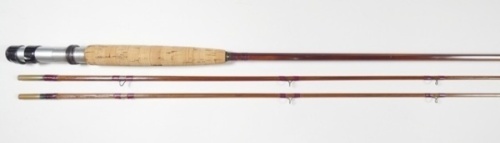 An Orvis 2 piece (2 tips) impregnated cane trout fly rod, 8'6", crimson silk wraps, alloy screw grip reel fitting, suction joints, one ring re-whipped, serial no. 28271, reel seat engraved "R.300-224-10-428-928/152-03-8081, in alloy tube