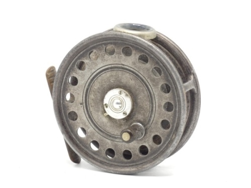 A Hardy St George 3 ?" trout fly reel, shallow cored drum with ebonite handle and three screw spring release latch, ribbed brass foot, white agate line guide (no cracks), milled rim tension screw and Mk.II check mechanism, circa 1930 and a Hardy "Houghto