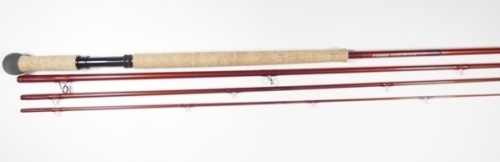 A good Sage "Method" 4 piece carbon salmon fly rod, 15', #10, red silk wraps, black anodised screw grip reel fitting, very little used condition, in bag and alloy tube