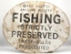 An oval enamelled metal Izaak Walton Angling Society sign, white background with black writing "Izaak Walton Angling Society ' Fishing Strictly Preserved, Trespassers Prosecuted", some restoration and damage to enamel work but a nice piece of angling hist