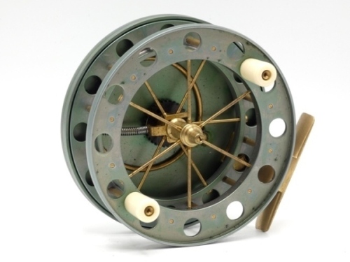 A fine and rare Paul Witcher Bisterne Aerial 4" centre pin reel, caged and six spoked drum with twin xylonite handles, perforated front and rear flanges (twelve holes) and rear mounted drum release fork, brass stancheon foot, rear sliding optional check b