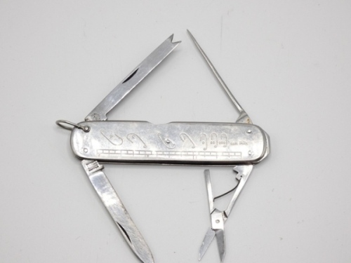 A Wm. Rodgers nickel silver angler's knife, fitted six various tools, hinged shackle, one side plate stamped inch measure and hook gauge, in original leather sleeve, 1940's
