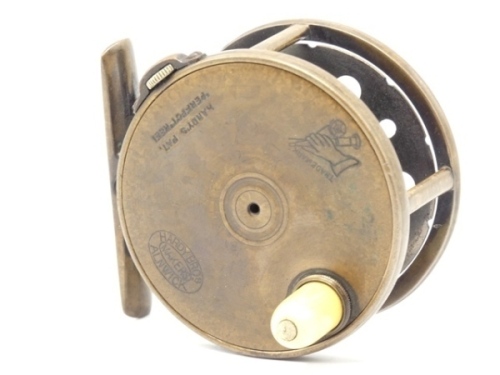 A scarce Hardy 1896 Brass Perfect 2 ¾" wide drummed trout fly reel, domed ivorine handle, block foot pierced seven holes, strapped rim tension screw and later factory fitted 1905 calliper spring check mechanism, open ball race with phosphor bronze bearin
