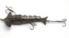 A rare Gregory Jointed Cleopatra 3 ¼" nickel silver bait, the six section reticulated fish shaped lure with painted decoration, twin head spinning vanes both stamped "Patent", stud eyes, two side and one rear gimp mounted flying treble hooks, original gim