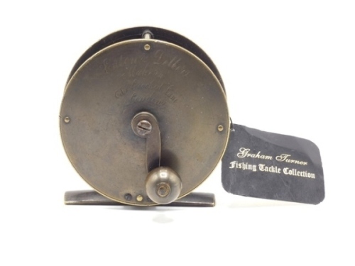 An Eaton & Deller 3 ¼" brass salmon winch, rarely seen ball handle mounted on "S" scroll crank winding arm, rivetted block foot, triple cage pillars , rear raised check housing and fixed check mechanism, faceplate script engraved makers details, ex Graha