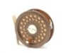A Hardy JLH Ultralite #2/3/4 trout fly reel, bronze anodised finish, rosewood handle, two screw drum latch, rear milled spindle mounted tension adjuster, light use only in neoprene pouch and a Sage "SP 489-5" 5 piece (2 tips) carbon trout fly rod, 8'9", 
